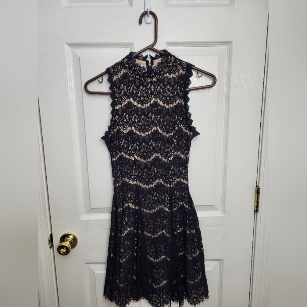 3 for 10!! black and tan lace dress. Xs.
